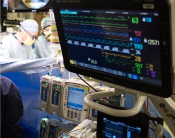 Closeup of computer screen showing a patient's vitals during a procedure.